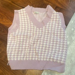 Oversized houndstooth vest.